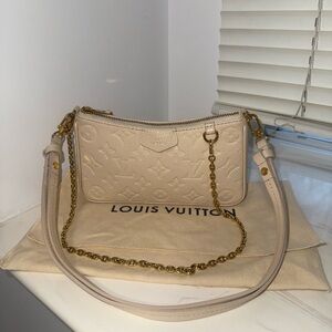 Louis Vuitton Easy Pouch on Strap Empreinte Leather in Creme